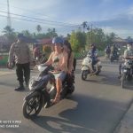 BERIKAN KENYAMANAN KEPADA PENGUNA JALAN,POLSEK SUNGAI RAYA LAKUKAN PENGATURAN ARUS LALU LINTAS