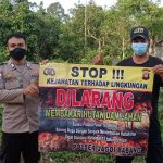 Gencar Sosialisasikan Karhutla Bripka Hendro Lakukan Sosialisasi Lewat Banner