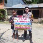 <em>Bhabinkamtibmas Sosialisasi Stop Pungli Kepada Masyarakat</em>