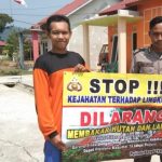 <em>Wujudkan Kelurahan Bebas Polusi, Bhabinkamtibmas Sosialisasi Karhutla</em>